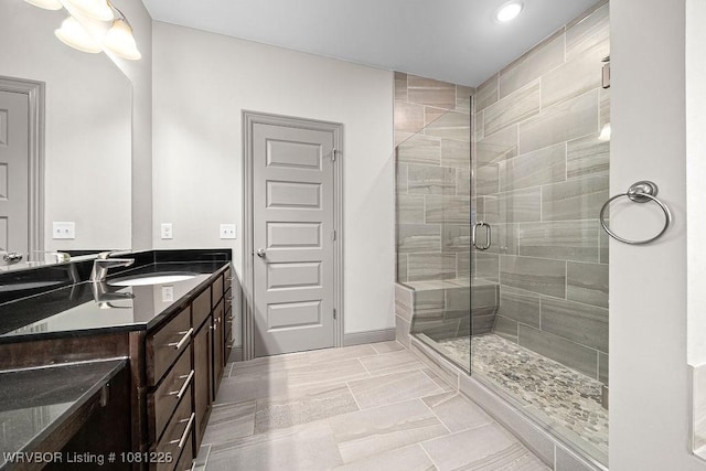 9205 R A Young Jr Dr, Fort Smith, AR 72916 - full bath featuring vanity, a stall shower, recessed lighting, and baseboards