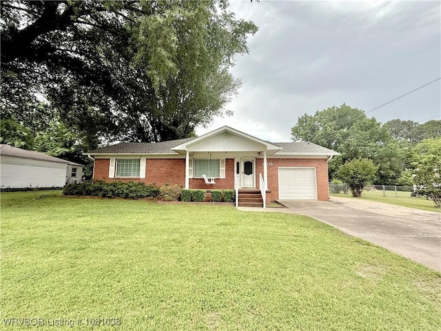 ranch-style house featuring an attached garage, concrete driveway, and brick siding