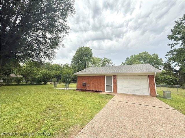 garage with concrete driveway