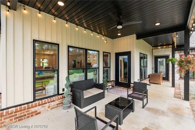 view of patio with outdoor lounge area and ceiling fan