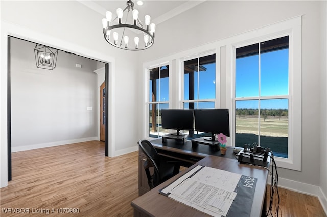 office area with hardwood / wood-style floors and a chandelier