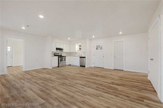 unfurnished living room featuring light hardwood / wood-style flooring