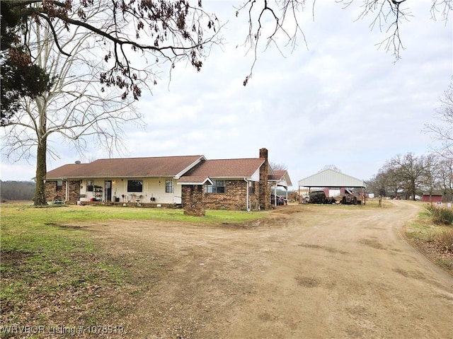 single story home featuring a front yard