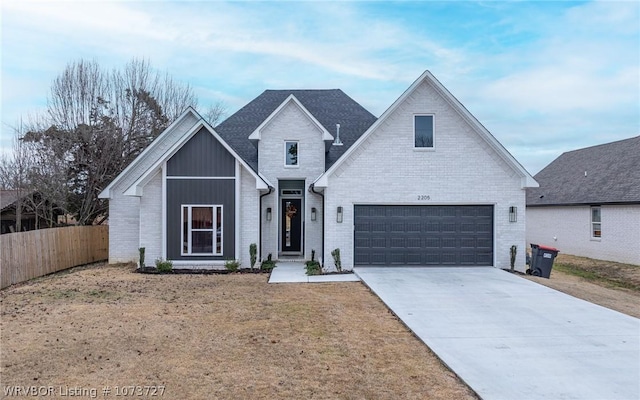 view of front of property featuring a garage