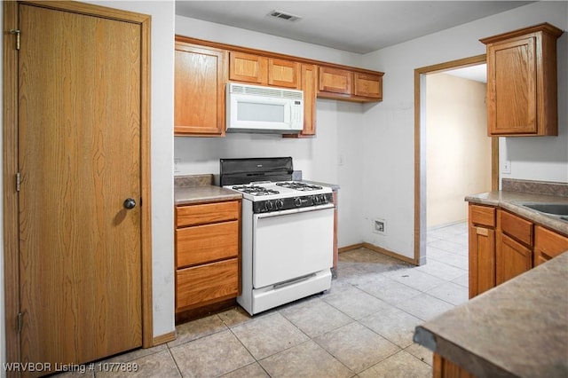 kitchen featuring white appliances