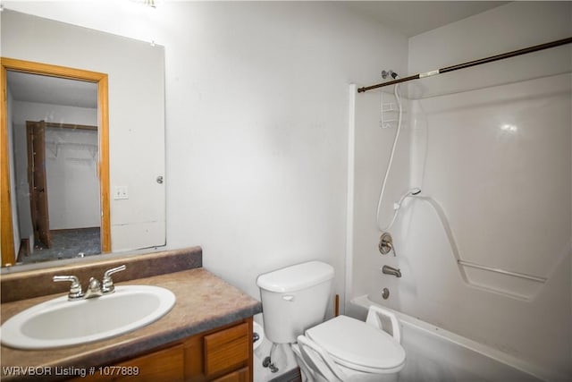 full bathroom featuring vanity, shower / bathtub combination, and toilet