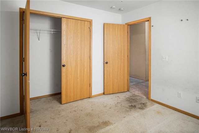 unfurnished bedroom featuring a closet