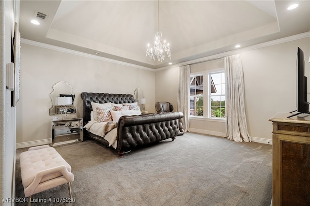 bedroom featuring ornamental molding, carpet floors, a raised ceiling, and a notable chandelier