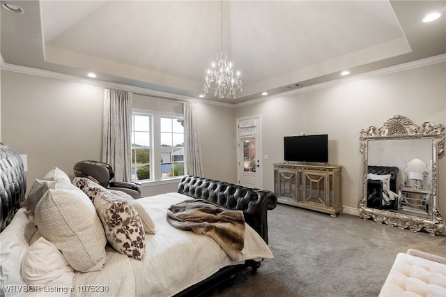 carpeted bedroom with a chandelier, a raised ceiling, and ornamental molding