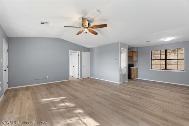 unfurnished living room with ceiling fan, light hardwood / wood-style floors, and vaulted ceiling