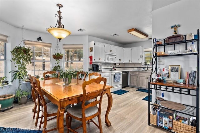 dining area featuring light hardwood / wood-style flooring