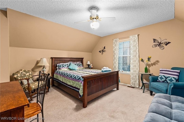 carpeted bedroom with ceiling fan, a textured ceiling, and vaulted ceiling