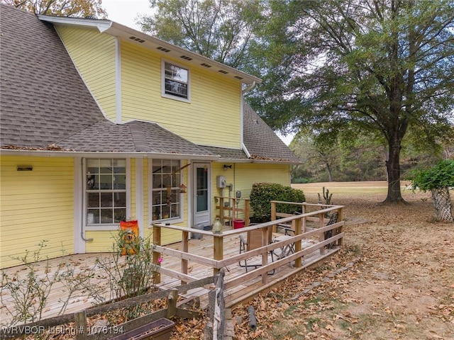 rear view of house with a deck