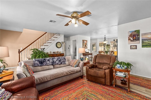 living room with ceiling fan