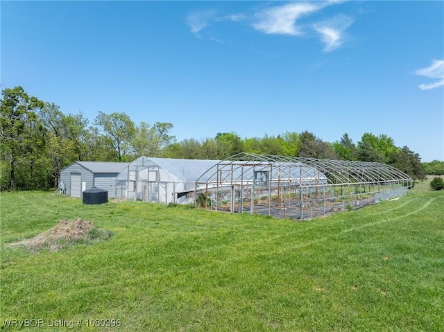 24401 Brazil Creek Loop, Shady Point, OK 74956 - view of pool featuring a greenhouse, a yard, and an outbuilding