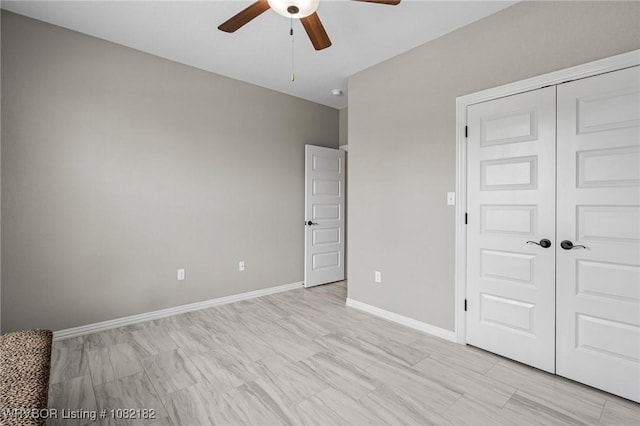 9505 Harmony Ridge Rd, Fort Smith, AR 72916 - unfurnished bedroom featuring a closet and a ceiling fan