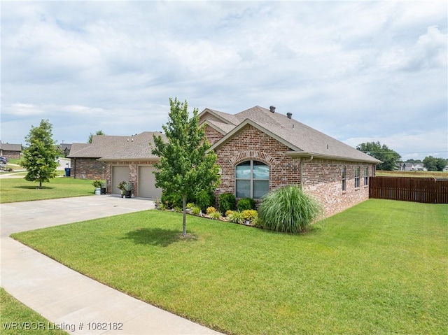 9505 Harmony Ridge Rd, Fort Smith, AR 72916 - view of front facade with brick siding, an attached garage, concrete driveway, and a shingled roof