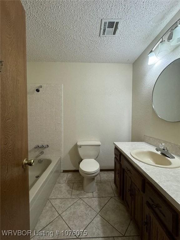 full bathroom with vanity,  shower combination, tile patterned flooring, toilet, and a textured ceiling