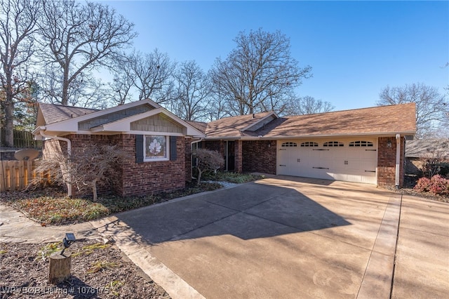 ranch-style house featuring a garage