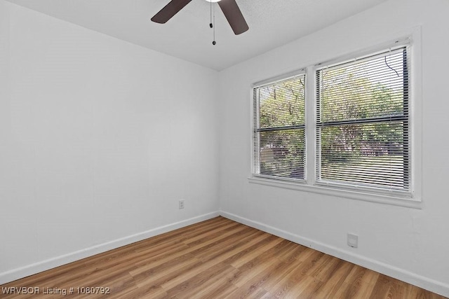 4308 25th St, Fort Smith, AR 72901 - empty room featuring light wood-type flooring, baseboards, and a ceiling fan