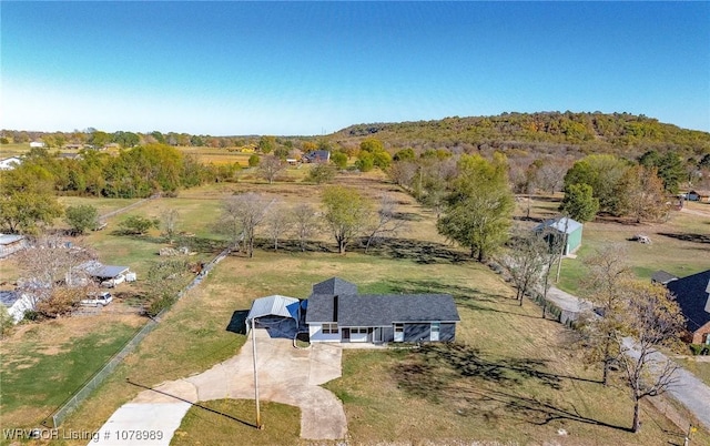 birds eye view of property featuring a rural view