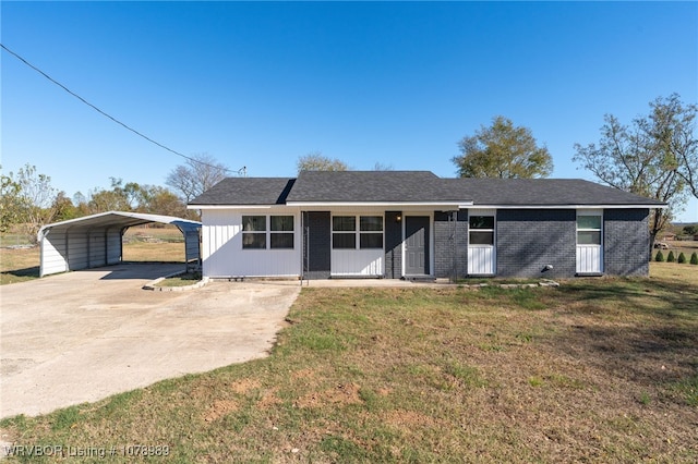 view of front of property featuring driveway, a carport, a front lawn, and brick siding