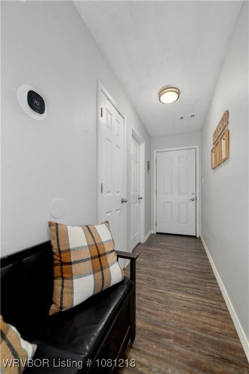 128 Saskatchewan Rd, Roland, OK 74954 - hall with dark wood-type flooring and baseboards