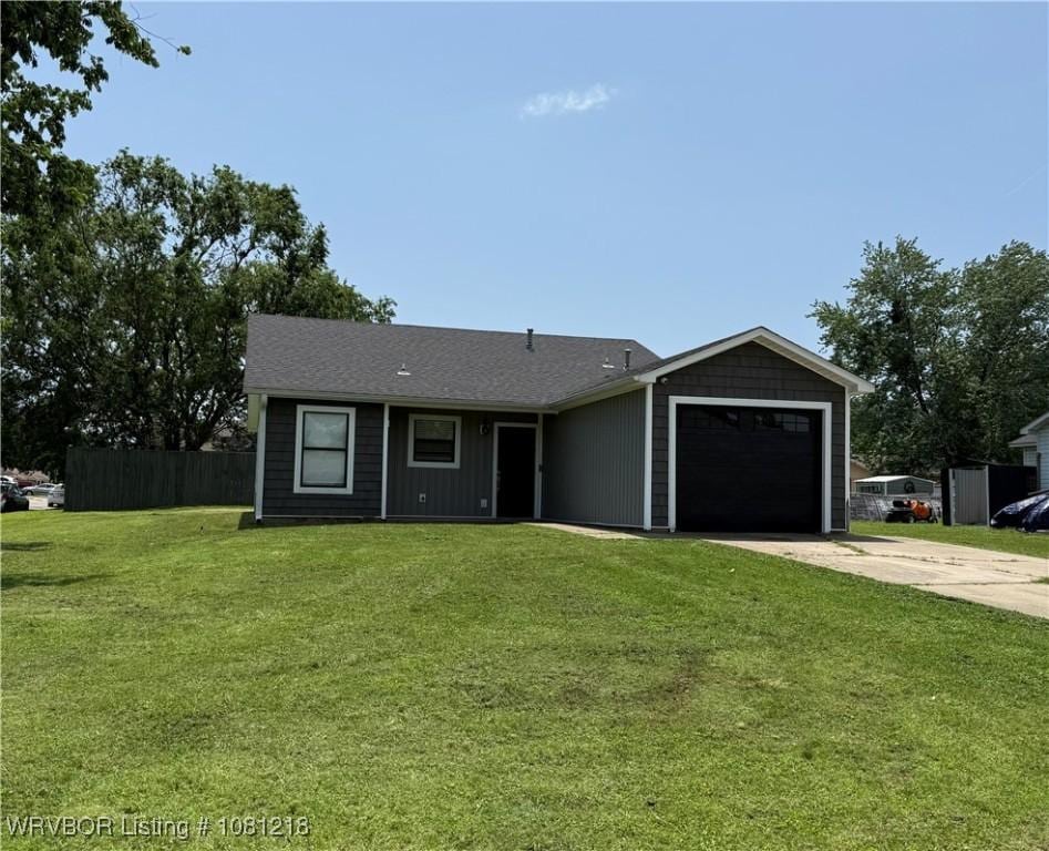 128 Saskatchewan Rd, Roland, OK 74954 - view of front of property featuring driveway and a garage