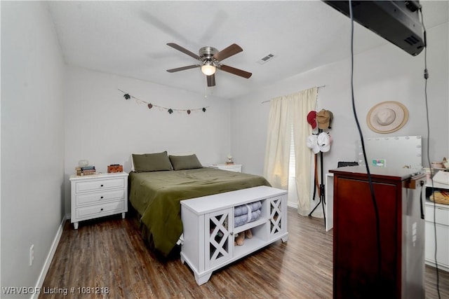 128 Saskatchewan Rd, Roland, OK 74954 - bedroom with wood finished floors, baseboards, and a ceiling fan