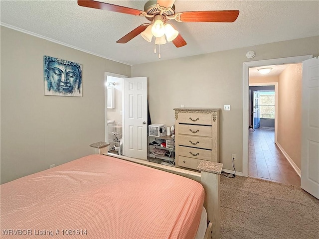3809 Chaffee Dr, Fort Smith, AR 72904 - carpeted bedroom with a textured ceiling and a ceiling fan