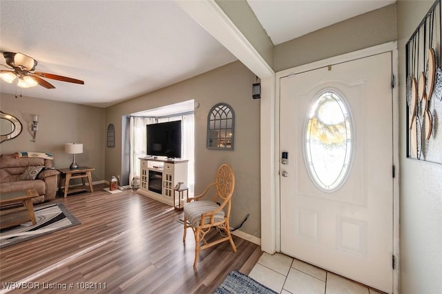 405 Woodland Hills Blvd, Roland, OK 74954 - entrance foyer featuring ceiling fan and light wood-type flooring