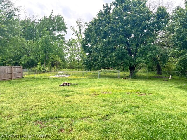 view of yard with fence