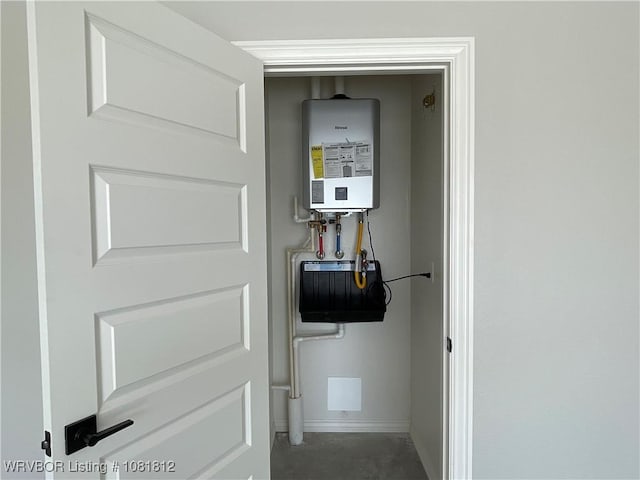 9109 Wayne Xing, Fort Smith, AR 72916 - utility room featuring tankless water heater