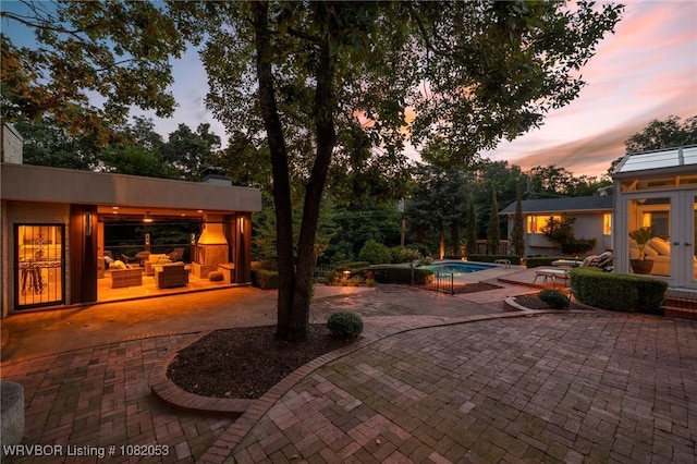 4110 S 34th St, Fort Smith, AR 72903 - view of patio featuring an outdoor pool, french doors, and an outdoor living space