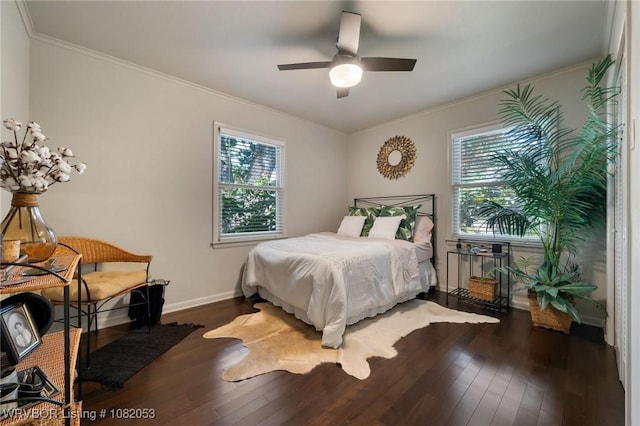 4110 S 34th St, Fort Smith, AR 72903 - bedroom with multiple windows, dark wood-style flooring, crown molding, and ceiling fan