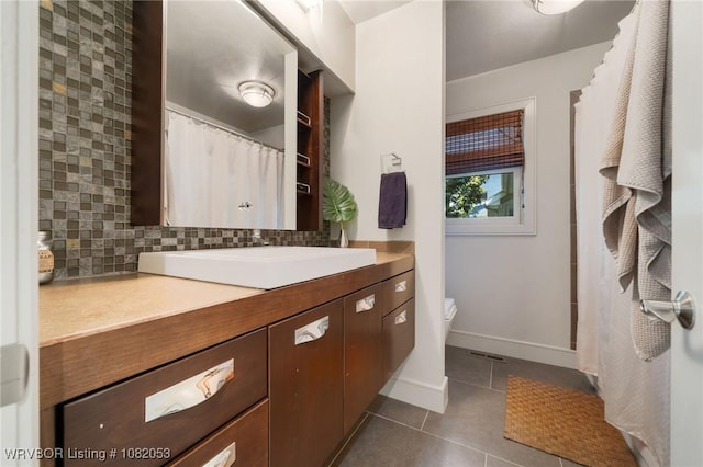 4110 S 34th St, Fort Smith, AR 72903 - bathroom with tile patterned flooring, tasteful backsplash, and vanity