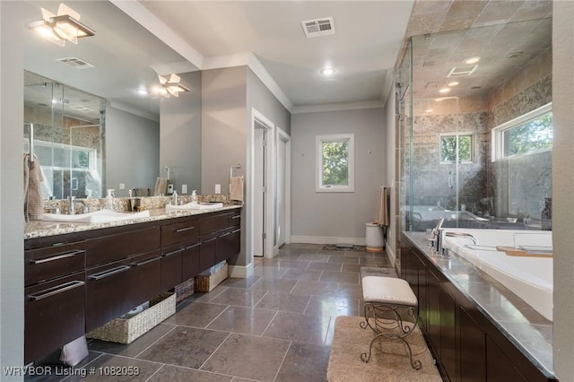 4110 S 34th St, Fort Smith, AR 72903 - full bath featuring double vanity, a bath, a shower stall, ornamental molding, and stone tile flooring