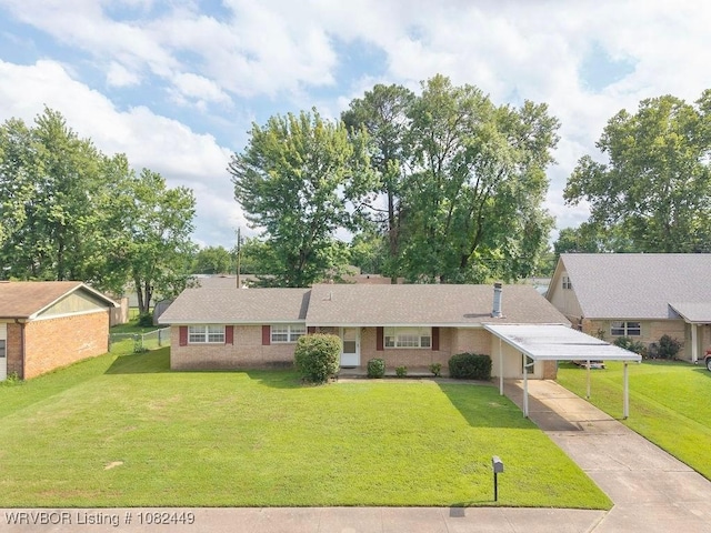 121 Dartmouth Ln, Fort Smith, AR 72908 - view of front of house featuring a carport, concrete driveway, and brick siding