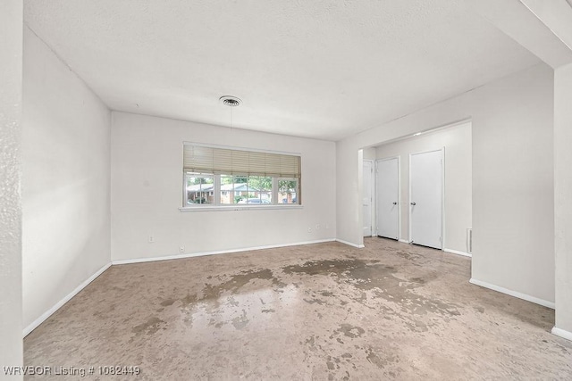 121 Dartmouth Ln, Fort Smith, AR 72908 - spare room featuring unfinished concrete floors and baseboards