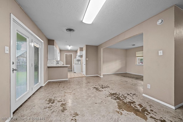 121 Dartmouth Ln, Fort Smith, AR 72908 - unfurnished room featuring a textured ceiling and unfinished concrete floors
