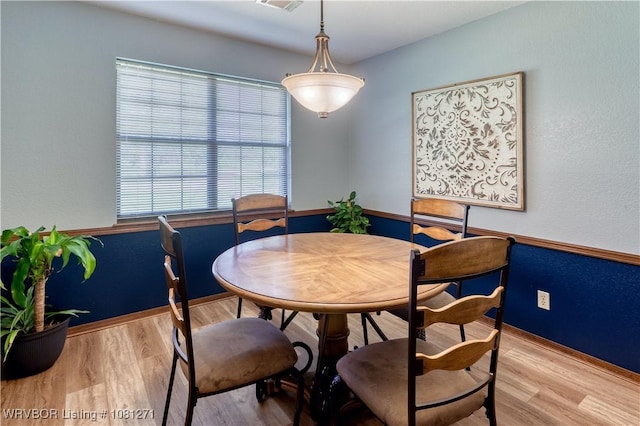 3001 Coral Cir, Alma, AR 72921 - dining room featuring wood finished floors and baseboards
