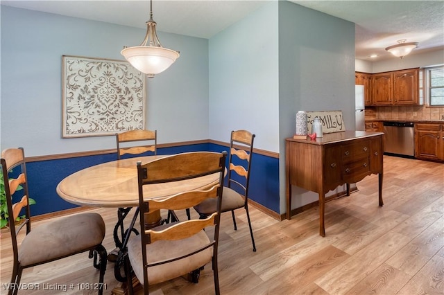 3001 Coral Cir, Alma, AR 72921 - dining space featuring light wood finished floors and baseboards