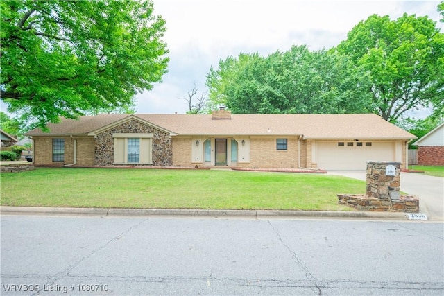 single story home featuring concrete driveway, an attached garage, a chimney, and a front lawn