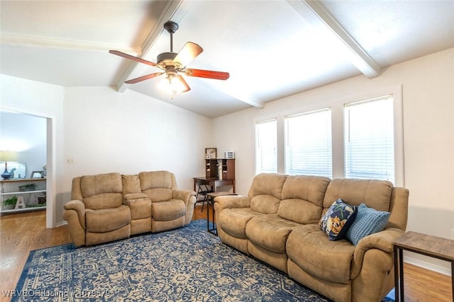 living room featuring vaulted ceiling with beams, ceiling fan, and wood finished floors