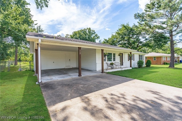 1723 N 52nd St, Fort Smith, AR 72904 - single story home with driveway, a porch, and a carport