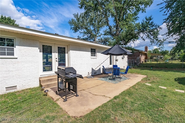 1723 N 52nd St, Fort Smith, AR 72904 - view of patio / terrace with grilling area, entry steps, and french doors