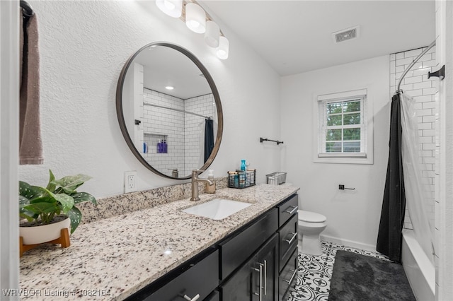 1723 N 52nd St, Fort Smith, AR 72904 - full bathroom with vanity, tile patterned floors, and shower / bath combo with shower curtain