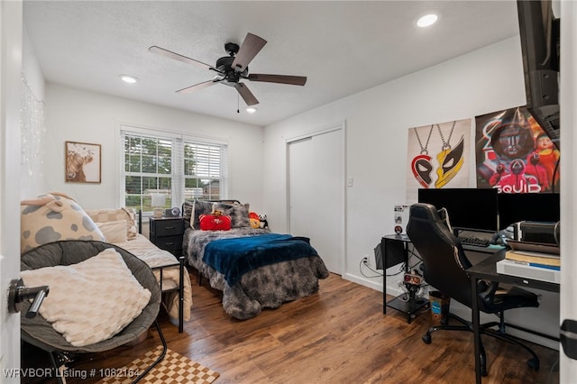 1723 N 52nd St, Fort Smith, AR 72904 - bedroom featuring wood finished floors, a desk, a ceiling fan, a closet, and recessed lighting