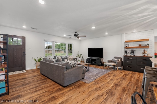 1723 N 52nd St, Fort Smith, AR 72904 - living room featuring recessed lighting, ceiling fan, wood finished floors, and plenty of natural light