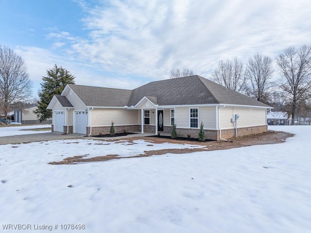 ranch-style home with a garage